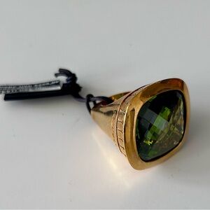 Rebecca Statement Ring with Large-faceted Green Peridot Stone.